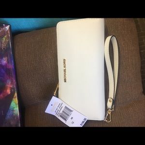 Large women’s Michael Kors wallet wristlet also